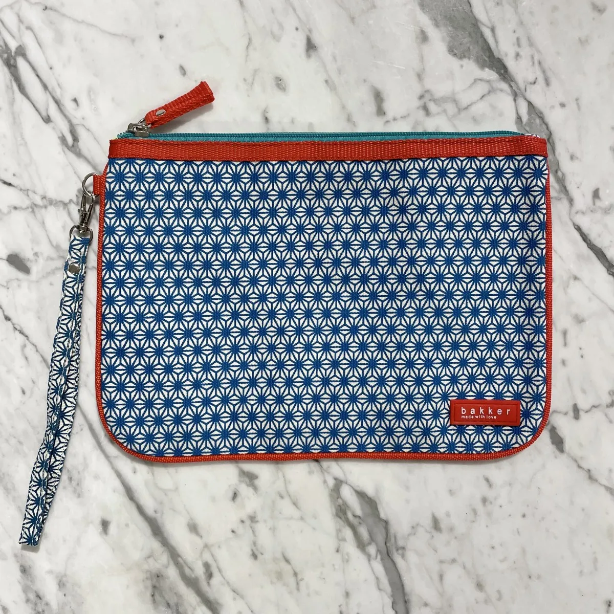 Bakker - Pochette bleue à motif fleurs